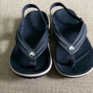Crocs Navy Flip Flops. C 11